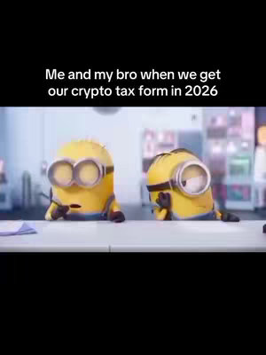 The cover image displays a scene from the animated movie 'Despicable Me,' featuring two yellow Minions. The image is set in an office environment, with the Minions positioned behind a white, countertop-like surface. One Minion, on the left, holds a pen, appearing to write or calculate something, while the other rests his hand on his chin, portraying a thoughtful posture. The background is blurred, suggesting an office setting, but the sharp focus is dedicated to the Minions. Above the Minions, white text says, 'Me and my bro when we get our crypto tax form in 2026'.
