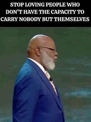The cover image is a screenshot of a man addressing an audience. He is a dark-skinned man, wearing eyeglasses with a gray beard and a navy suit. The background is a gradient of muted green and blue. At the top of the image, there is text which is in white font on a black banner.