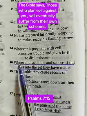 The image shows an open Bible with highlighted text and overlayed text. A pen is resting on the open page with text from the Bible.  A light purple rectangular box with a white font overlays the Bible verse at the top.  A second lighter purple rectangle box with a white font containing the text 'Psalms 7:15' is placed at the bottom of the image.