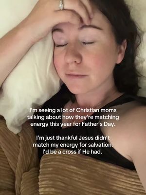 A woman with fair skin and dark hair lies in bed, her eyes closed, with a hand resting on her forehead in a gesture of thought. She's wearing a dark top, and a patterned blanket is visible on the bed. Text overlays appear in the image, discussing matching energy and salvation.