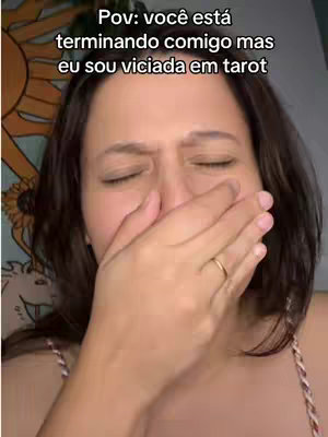 A woman with dark hair holds her hand over her mouth, making a gesture of distress or shock. Text on the image narrates a relatable, emotional scenario, which adds context to the creator's emotive facial expression.