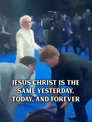The cover image shows a group of people, with a man in a white suit standing in the center, facing forward. People are reaching out towards him and another man, seemingly kneeling, appears to be assisted by two individuals. The background is blurred, but suggests a large crowd, possibly an event or gathering. Text overlayed at the bottom says, 'JESUS CHRIST IS THE SAME YESTERDAY, TODAY, AND FOREVER'.