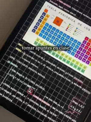 A tablet screen displaying digital notes on a black background with a grid pattern. The notes include formulas and a periodic table. The text overlay at the bottom says: "tomar apuntes en clase".