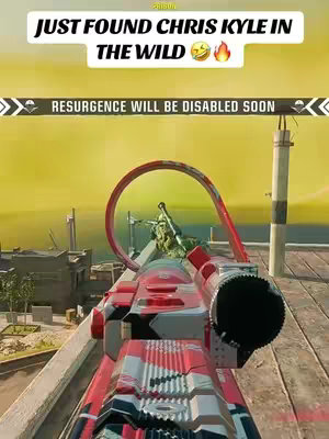 The image shows a first-person perspective from a Call of Duty: Warzone game. The player is aiming down the sight of a red-and-black camo weapon at a rooftop. Overlay text states 'JUST FOUND CHRIS KYLE IN THE WILD' with multiple emojis and 'RESURGENCE WILL BE DISABLED SOON'. The background is an out-of-focus cityscape with an overcast sky.