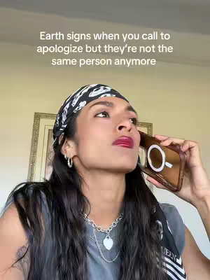 The cover image shows a woman on the phone, looking up and slightly to the left with a thoughtful expression. She has dark hair, a patterned headscarf, and is wearing a gray top and a necklace with a heart pendant. The phone is held to her ear. Text overlays the image at the top.
