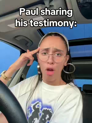 The cover image is a selfie taken inside a car. The focus is on a young woman with dark hair, wearing glasses and a white headband. She has a surprised or concerned expression, with her mouth open and her finger pointed towards her temple. She's wearing a white t-shirt and large hoop earrings. The background shows the car's interior, including the windshield and a glimpse of the outside sky, with a text overlay in white capital letters across the top. The image has a slightly warm color palette and candid overall composition.