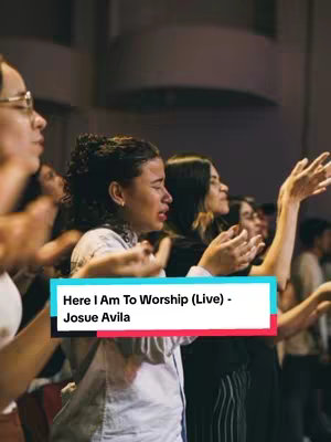 A photo of a worship service, with several women in the foreground raising their hands in praise. One woman is tearful, and a text box at the bottom identifies the song and artist.