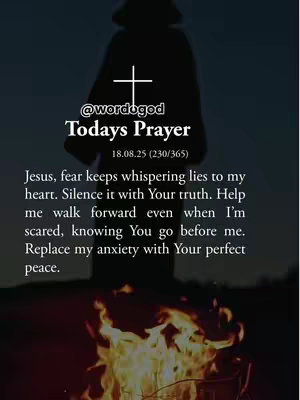 An image of dark background, with a silhouette of a person standing in front of a fire, and a text overlay with a prayer. There is a sign of a cross.