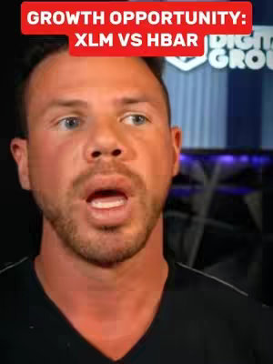 A close-up shot of a man with short, light brown hair and a trimmed beard. He has a slightly open mouth and appears to be speaking. Above him is a red banner with white text.