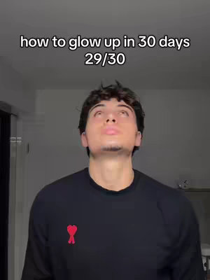 A selfie-style shot featuring a young man looking upwards with a slightly open mouth against a solid background. He is wearing a black sweatshirt. Text overlays the image, indicating the video's theme and progression sequence.