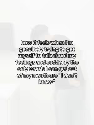 The image shows a person from the back, their form silhouetted against a blurred white and gray background. Overlaid on top is text written in black saying how it feels when trying to express feelings, but only saying 'I don't know'.