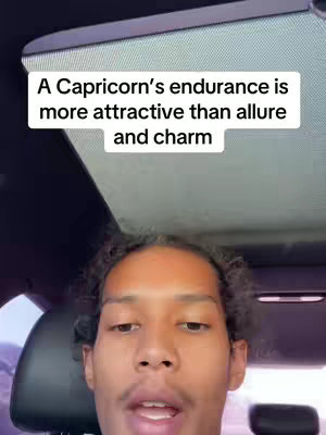 The cover image shows a man inside a car with text overlayed on top. The man has dark hair and is looking towards the camera. The text overlay is a white box with black text that reads, "A Capricorn's endurance is more attractive than allure and charm". The background is the interior of a car.