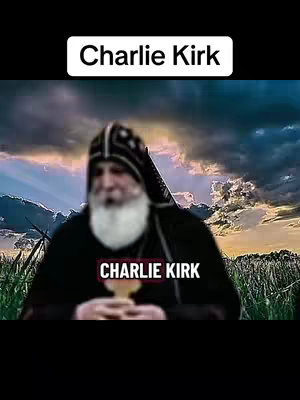 The image features a person with a beard and wearing a dark robe and head covering, standing in what appears to be a field of grain, with a dark and clouded sky above. The text overlay says 'Charlie Kirk' in a white box at the top and also in a text box near the figure's chest.