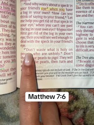 The cover image shows a close-up of a hand with a well-manicured light pink nail pointing at a passage in a Bible. The text reads "Matthew 7:6" in a white box at the bottom. The background text is a Bible passage with words highlighted.