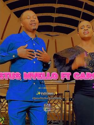 A video cover shows a man in a blue suit and a woman mostly behind him. Text overlays are visible on the image, indicating a music video.
