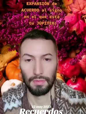 A selfie-style image featuring a man in the middle, surrounded by a background of flowers, berries and pumpkins. The text overlay is on the top and bottom of the image, which contain more text.