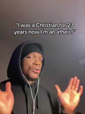 A man in a black hoodie and beanie is in front of a blurry background. Text at the top says, \"I was a Christian for 23 years now I'm an atheist\". He is looking at the camera and gesturing with his hands.