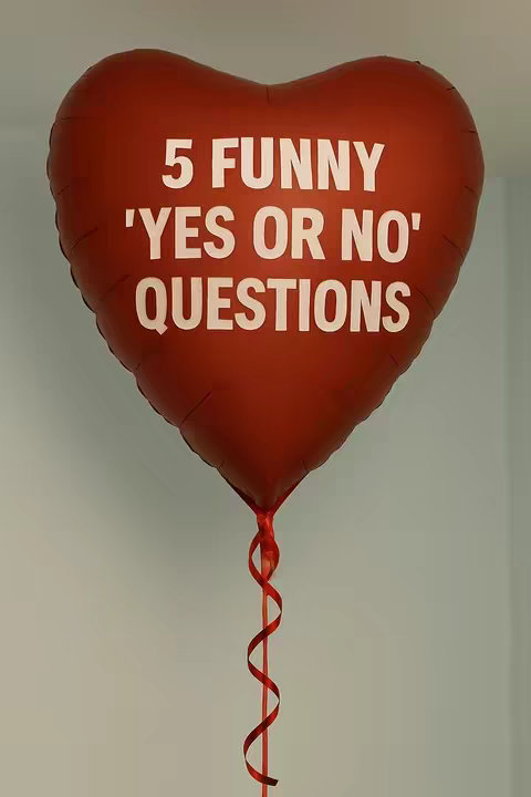 A red heart-shaped balloon with white text that reads '5 FUNNY 'YES OR NO' QUESTIONS'. The balloon has a red ribbon attached.