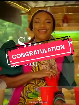 A woman with a joyous expression is holding a red cup. The image has a pink and red congratulations overlay. The background appears to be a lively outdoor setting.