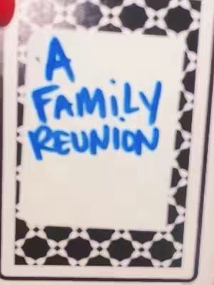 The cover image shows a graphic that looks like a tarot card. It has a white background with black and white patterned borders. In blue marker, it has text that says "A FAMILY REUNION".