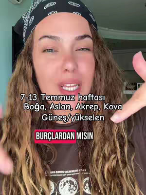 A woman with long wavy hair and a bandana smiles towards the camera. Text overlays are present, indicating a horoscope theme, while the background has a light blue wall.