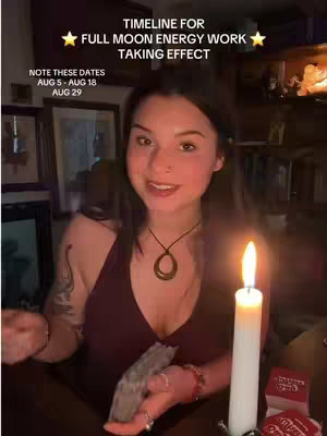 A woman with dark hair and fair skin is smiling at the camera. The background is a dimly lit room with a candle lit on the right. Text is overlaid.