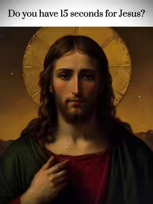 The image showcases a traditional, religious depiction of Jesus Christ, presented in a portrait format. He is depicted with long, dark hair and a beard, gazing forward with a serene expression. His attire includes a red inner garment and a dark green cloak. A radiant, golden halo encircles his head, enhancing the divine representation. The composition is set against a softly golden background, common in religious art, with text at the top.