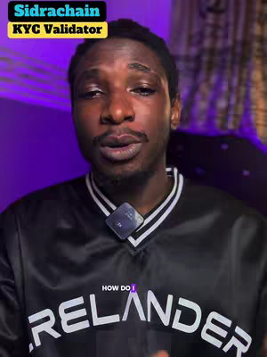 The cover image features a man speaking directly to the camera, set against a backdrop with purple and dark elements. The man wears a black jacket with white trim and a small microphone is attached to his collar. Text overlay indicates the video's title.