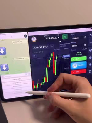 The cover image shows a person's hand holding a white stylus and pointing to a tablet screen. The screen is split; the left side displays a chat window with messages, while the right side shows a trading platform interface with a candlestick chart. The background is a light-colored surface.