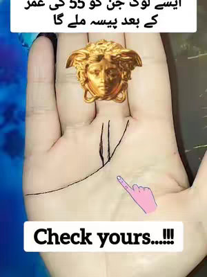 The image shows a close-up of a palm, with lines emphasized. A golden Medusa head pendant is laid on the fingers. Beneath the palm is the text in black, 'Check yours...!!!'. The background is a neutral, slightly blurred tone with some blue shades.
