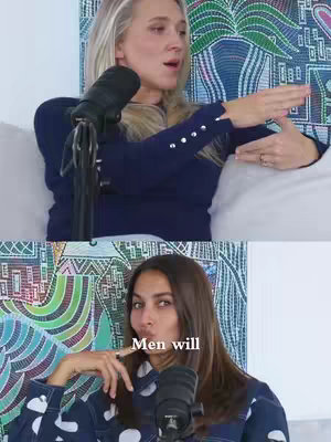 The image is a split screen. The top half shows a slender blonde woman with long hair, wearing a navy blue sweater, sitting on a white surface with a black microphone in front of her and her right hand raised to the right. The bottom half shows a woman with brown hair with her elbows on the table staring at the camera and wearing a patterned top. The text "Men will" is written on the bottom half of the image.