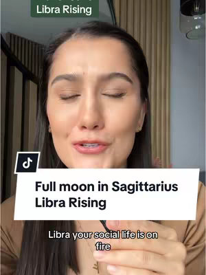 A woman with fair skin and brown hair is centered in the frame. She has her eyes closed, her mouth slightly open as if she is speaking, and is wearing a light brown top. Above her head, a green bar with the words 'Libra Rising' is placed. Below her, a white rectangle contains the text 'Full moon in Sagittarius Libra Rising' stacked vertically. Below that, at the very bottom a text reads "Libra your social life is on fire".