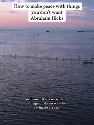 An aerial view of a body of water at sunset, with a network of stakes or poles jutting out of the water. The sky transitions from pink to pale blue, and a line of posts or low structures can be seen in the distance. The text overlay floats above the water surface, with a quote below the text.