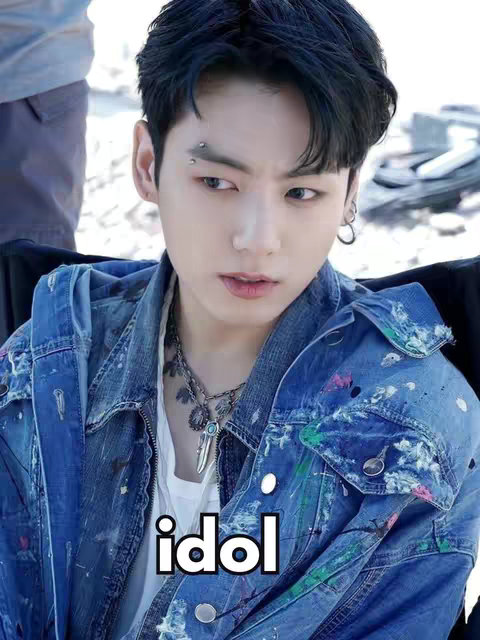 The cover image features a close-up of a person's face, identified by the caption as Jungkook. He has dark hair and a piercing above his eyebrow. He is wearing a denim jacket, and there is a text overlay that says 'idol' at the bottom of the image.