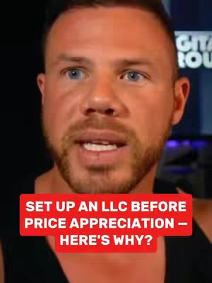A close-up shot of a man with fair skin, short brown hair, and a trimmed beard. He has blue eyes and a slightly open mouth, with a red rectangular text overlay at the bottom. The text overlay includes white text on a red background.