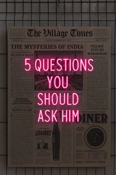 A close-up shot of a newspaper with the title 'The Village Times' in a classic font at the top. Below, the headline reads 'The Mysteries of India,' and a central, neon-pink sign displays the text '5 QUESTIONS YOU SHOULD ASK HIM' in a bold, sans-serif font.