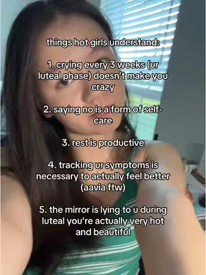 A selfie-style shot with the creator filling most of the frame. Text overlays list things 'hot girls understand,' with the creator framed from the chest up. The background is blurred and includes window blinds.