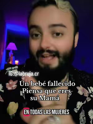 The cover image shows a medium-shot of a man with a beard and a patterned shirt looking towards the camera, slightly smiling. Overlaying the image is white text that reads "Un bebé fallecido Piensa que eres su Mamá EN TODAS LAS MUJERES". The background has a blurred purple or blue tone.