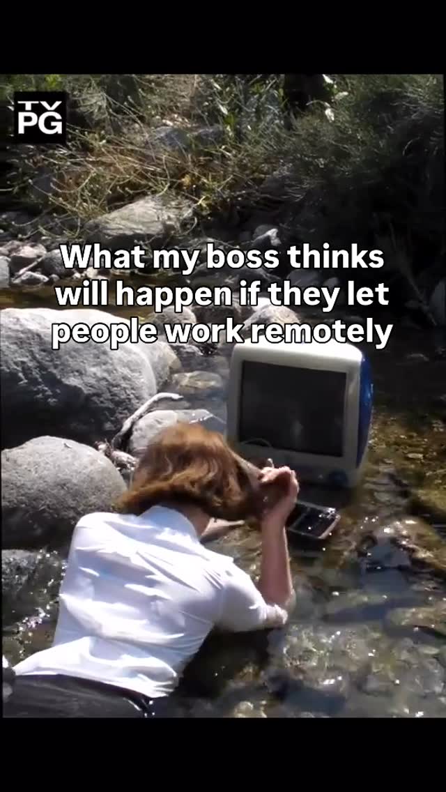 The image shows a woman in a white shirt standing in a stream with a vintage computer monitor. Text overlay is on the top and is white. The background showcases rocky river banks and greenery. The composition portrays a humorous take on remote work.