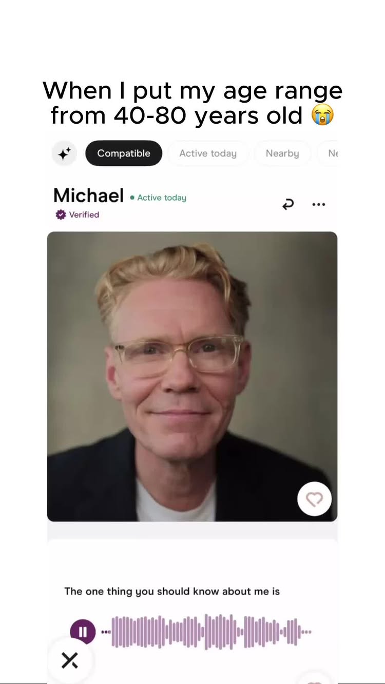 The image is a screenshot from the dating app Hinge. It shows a profile of a man named Michael, with fair skin, blond hair, and glasses. The text overlay indicates he used an age range of 40-80 years old. There are also interactive elements from the app visible.