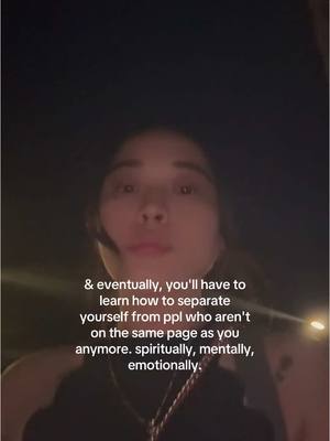 The cover image presents a selfie taken in a low-light environment. The main subject is a person, centered in the frame and looking directly at the camera. Text overlaying the image contains a quote in English.