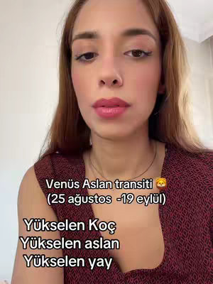 A woman with brown hair and red lipstick is centered in a selfie-style shot. Text overlays are positioned beneath her, with a background suggesting an indoor setting with natural light.