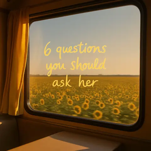 A view from inside a train looking out a window at a field of sunflowers. The window is a dark yellow-brown color, and the curtain on the side is yellow. The sky is a light blue. The text overlay says "6 questions you should ask her" in a yellow, handwritten style font.