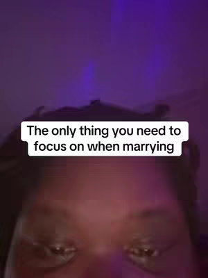 The image features a close-up view of a person's face, with the eyes and forehead prominently in focus. The background is a gradient of purple hues. A white text box with black text is positioned centrally near the person's eyes, stating 'The only thing you need to focus on when marrying'.