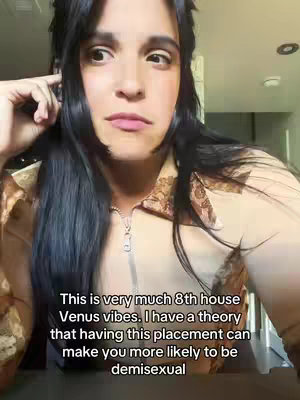 A woman with long, dark hair and a neutral expression is the primary focus. The background is blurred, suggesting an indoor setting. Text overlaid gives context to the video's astrology theme.