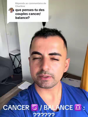 The image shows a man in a blue shirt, looking at the camera with a neutral expression. Overlay text at the bottom of the image reads 'CANCER / BALANCE ??????' in a white font. The background appears to be a room with a white door and a black object.