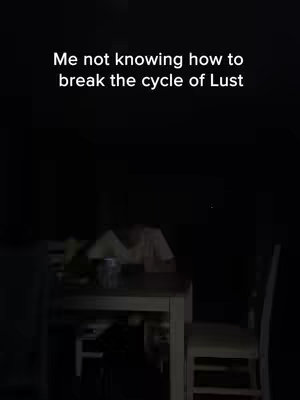 Dark image with text overlay. The text is white, and partially obscured by darkness. In the background, a table and chairs are vaguely visible. The overall ambiance is shadowy.