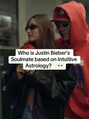 The cover image shows a medium shot of Hailey and Justin Bieber standing closely together. A white text box is superimposed on the bottom with the question "Who is Justin Bieber's Soulmate based on Intuitive Astrology?". The background is blurred, with neutral tones and a partially visible indoor setting making the subjects the focus.