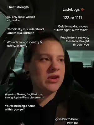 A person is seen in the interior of a car, likely the driver's seat, turned towards the camera speaking with text overlays on the image. Text on the left describes personality traits, while text on the right uses a ladybug theme.
