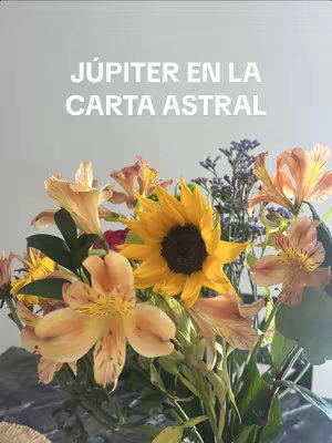 A bouquet of various flowers, including orange lilies and a prominent sunflower, is set against a soft, blurred background. White text overlays the image, presenting the video's title.